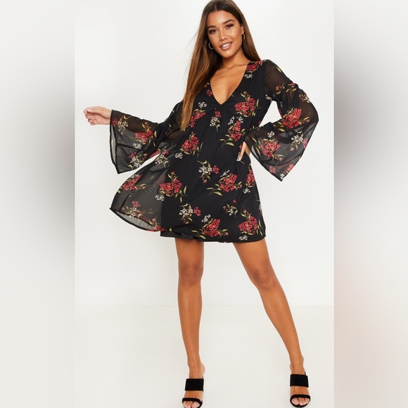PrettyLittleThing Dresses & Skirts - Pretty Little Thing Black Floral Mini Dress with Sheer Flared Sleeves (Size 12)